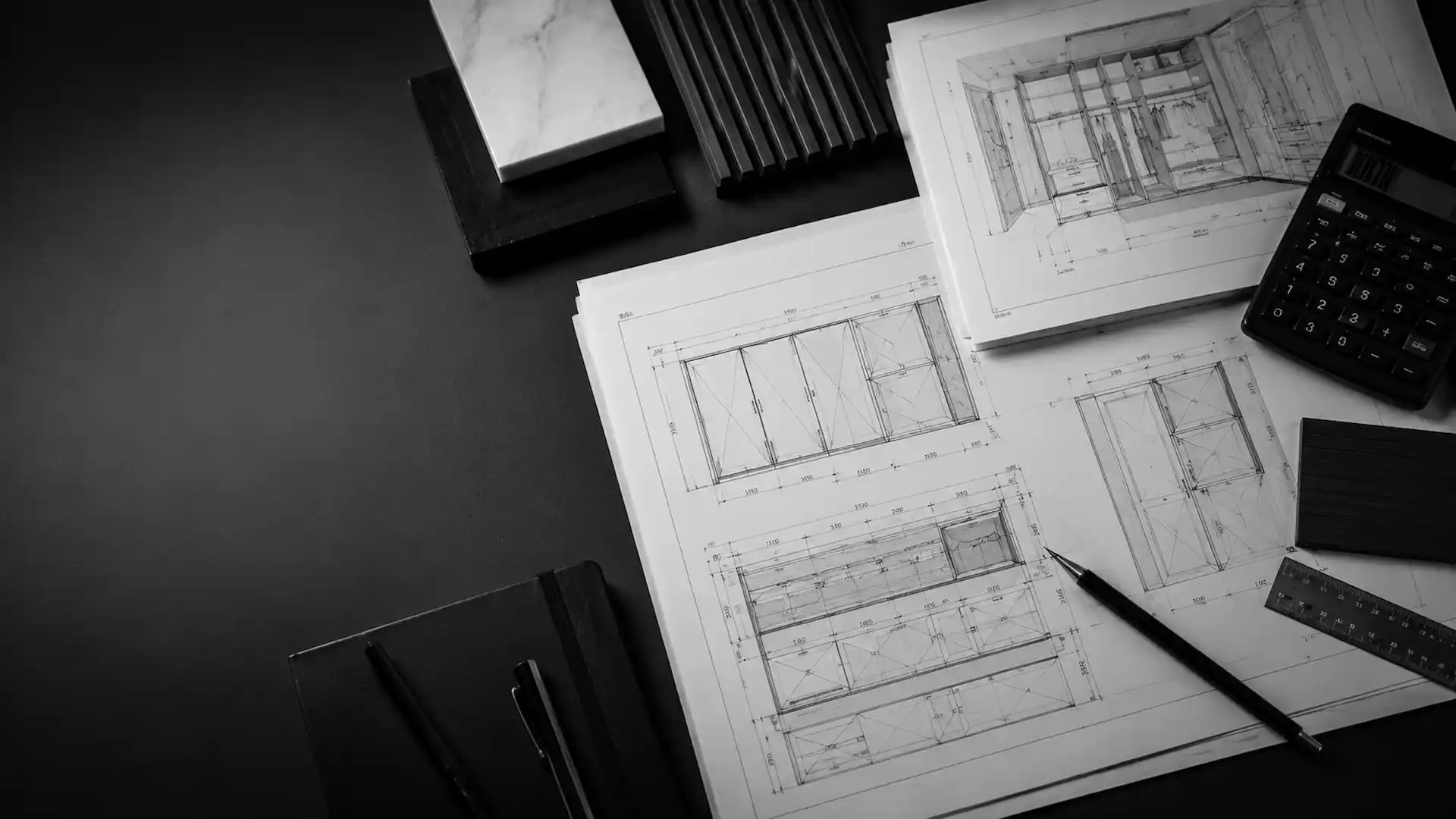 Plano técnico sobre mesa — cotizar muebles a medida Construmuebles